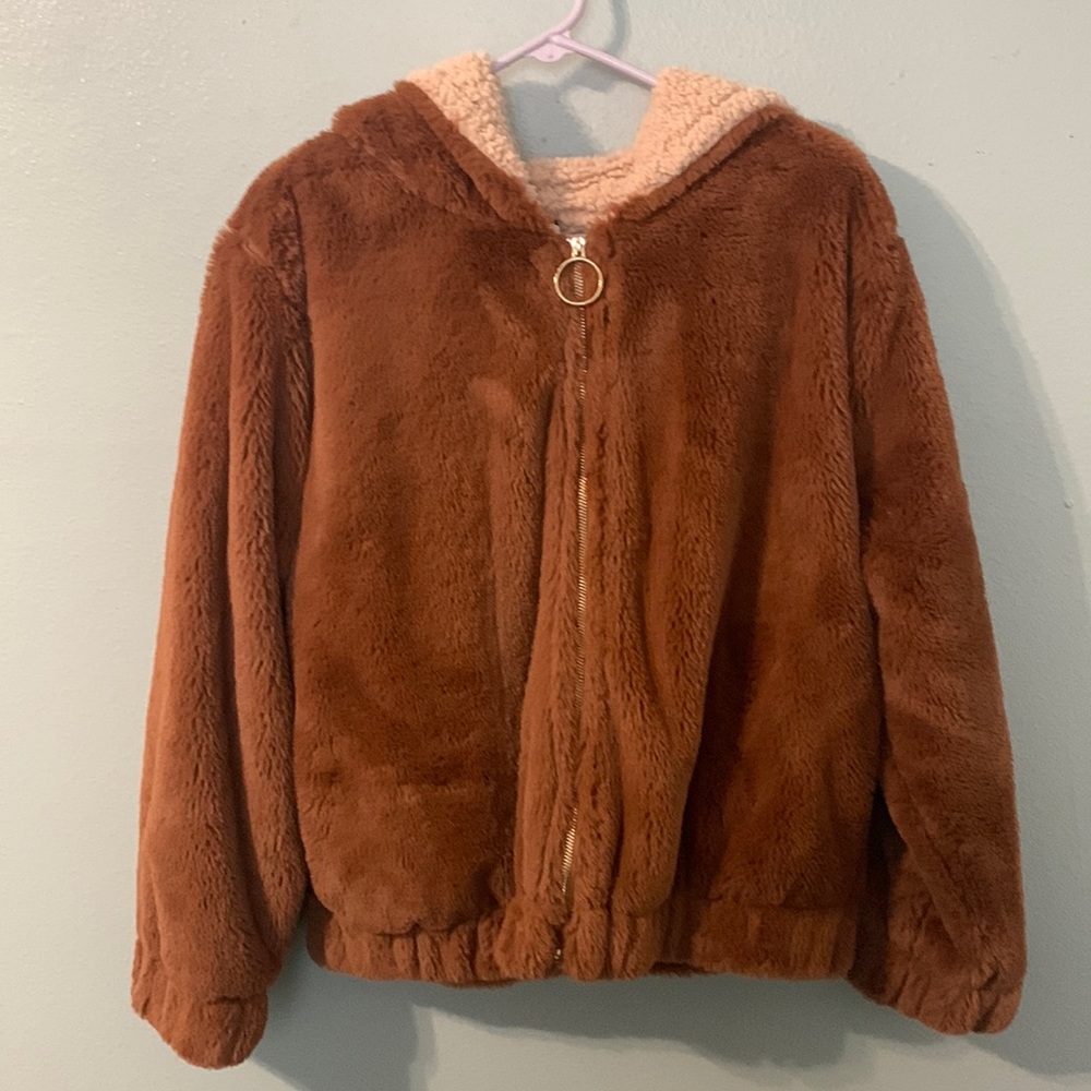A fluffy brown and beige jacket